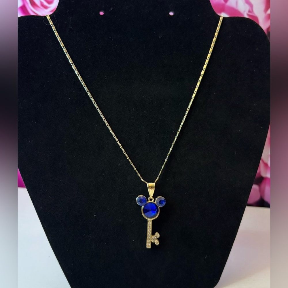 Elegant Gold and Blue Key Pendant Necklace